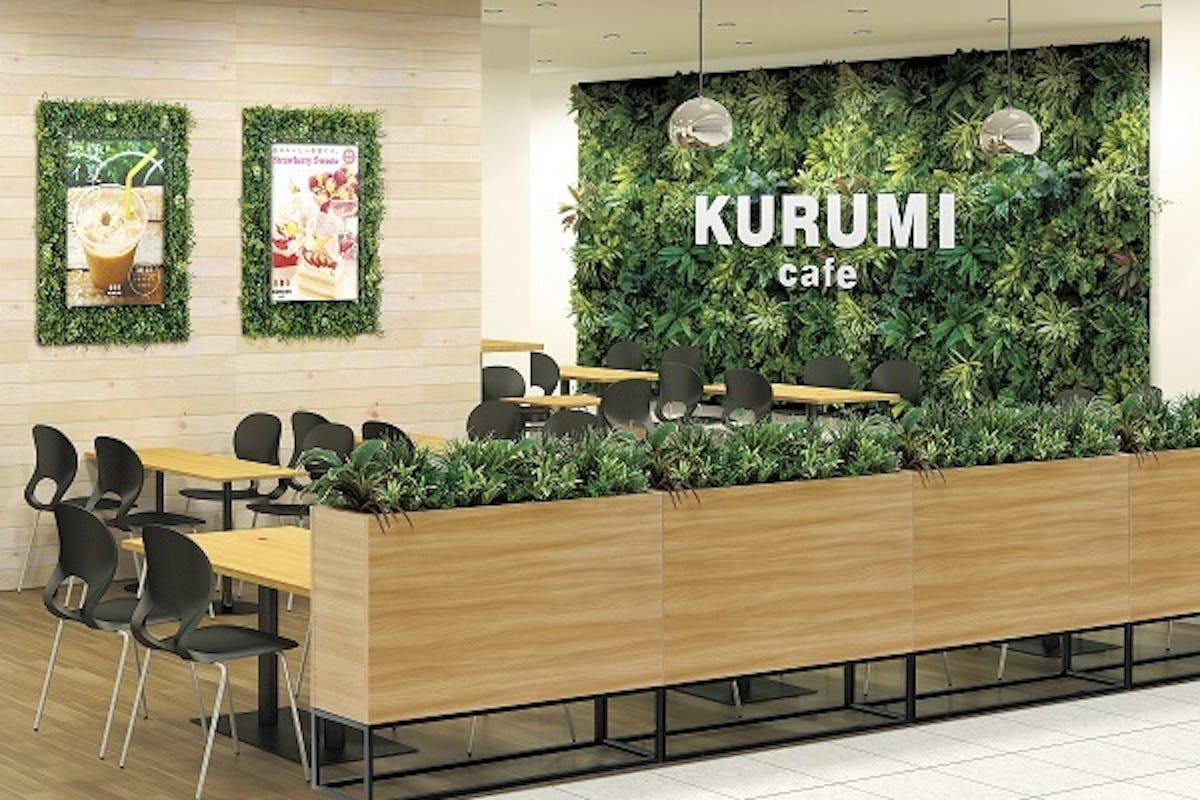 フェイクグリーンとサインを組み合わせた壁面緑化